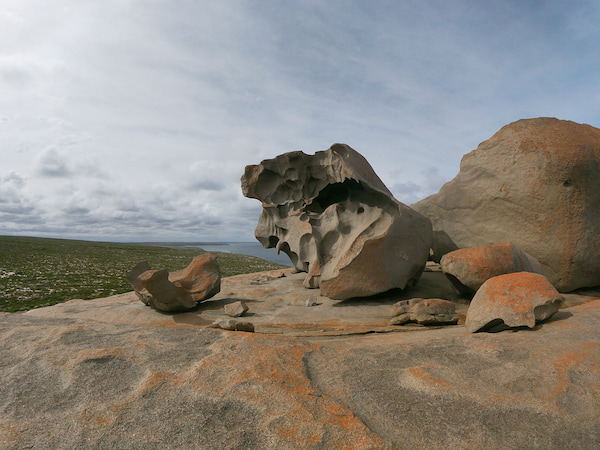 Sandstone rocks overlooking at ocean and peninsula.
