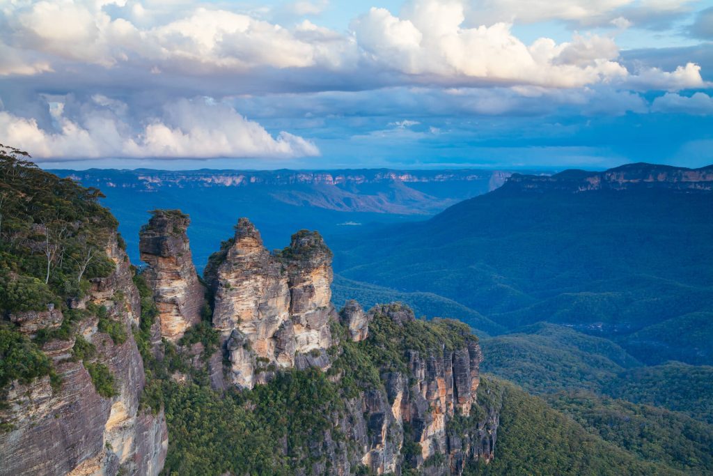 Three Sisters rock formation in the Blue Mountains | Featured image for the Must-See NSW National Parks blog for East Coast Car Rentals.