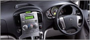dashboard view inside a hyundai imax 8-seater vehicle